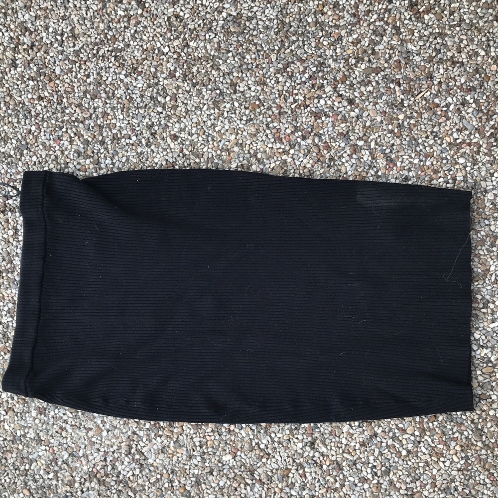 Mid - length black pencil skirt